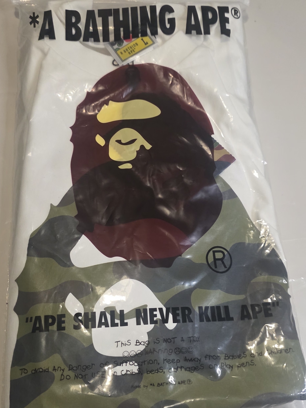 A Bathing Ape White Short Sleeve Tee with Brown & Olive Camo Ape Logo